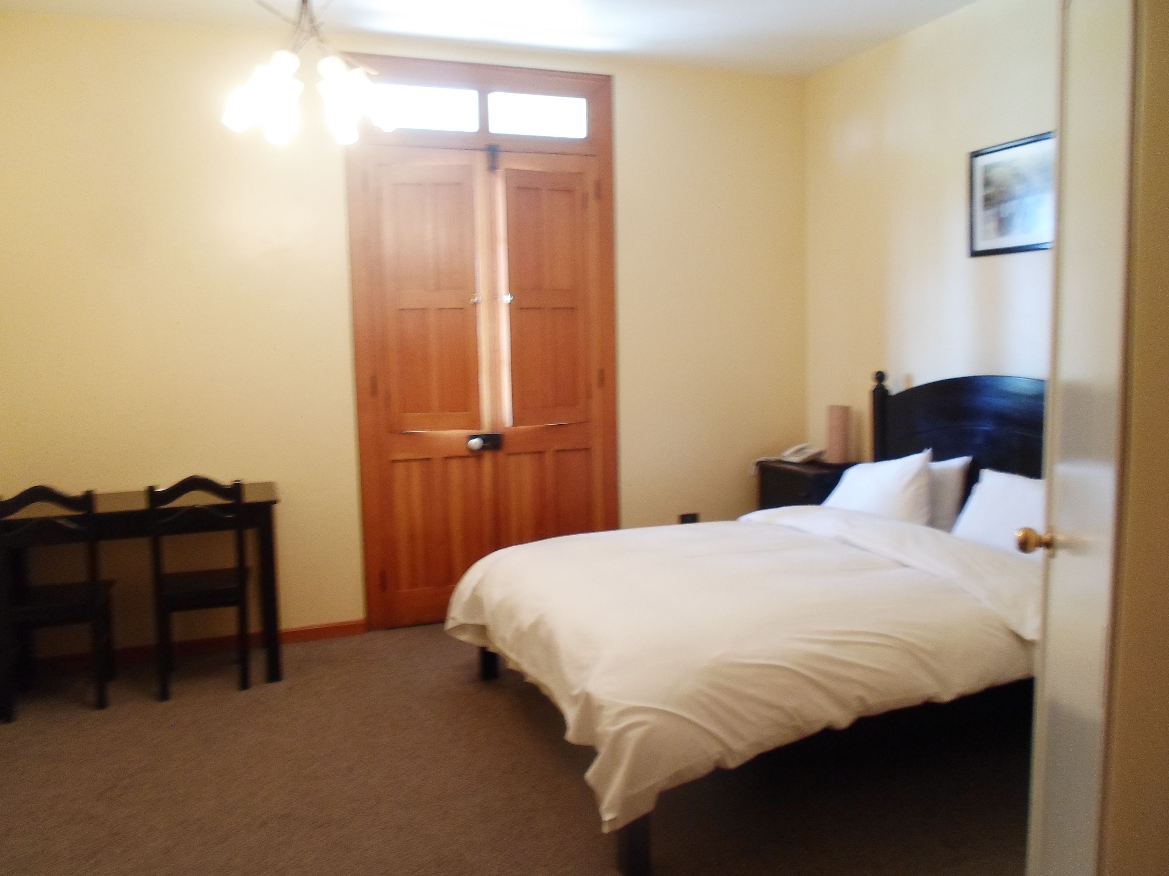 junior suite, 1 queen bed, city view | in-room safe, desk, free wifi
