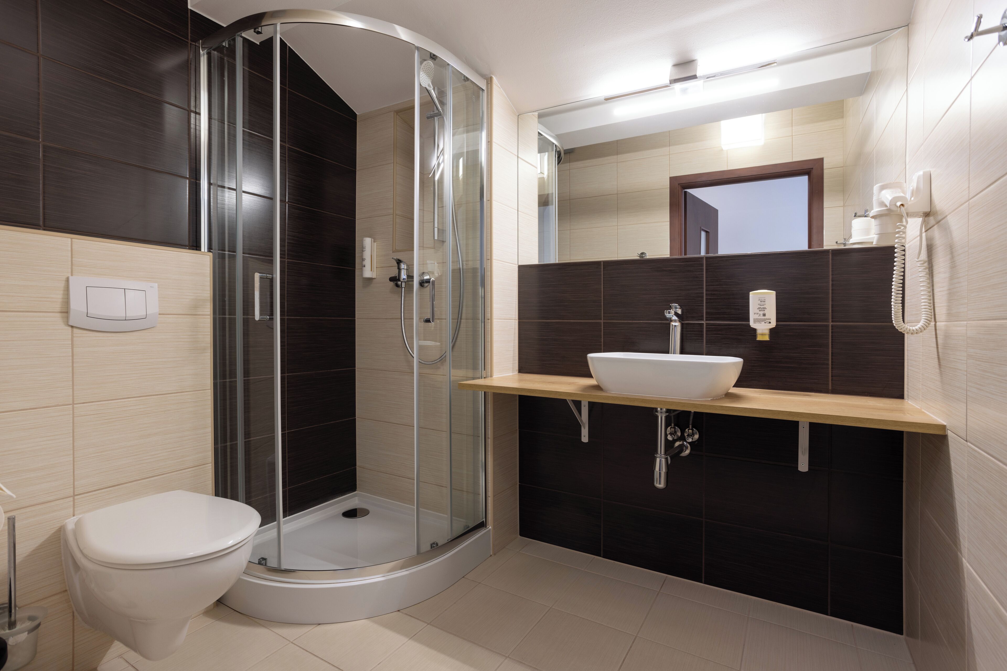 superior triple room | bathroom | shower, free toiletries, hair dryer, towels