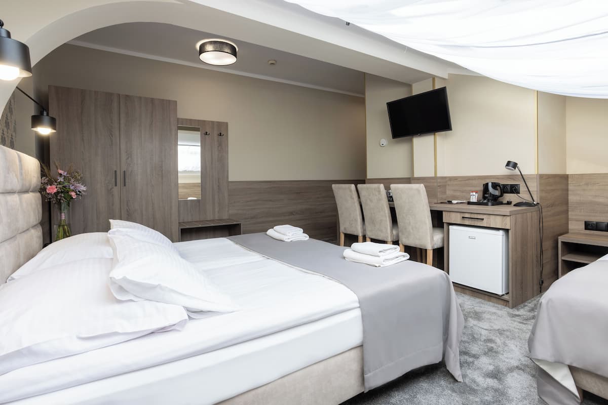 Superior Triple Room | Hypo-allergenic bedding, down comforters, in-room safe