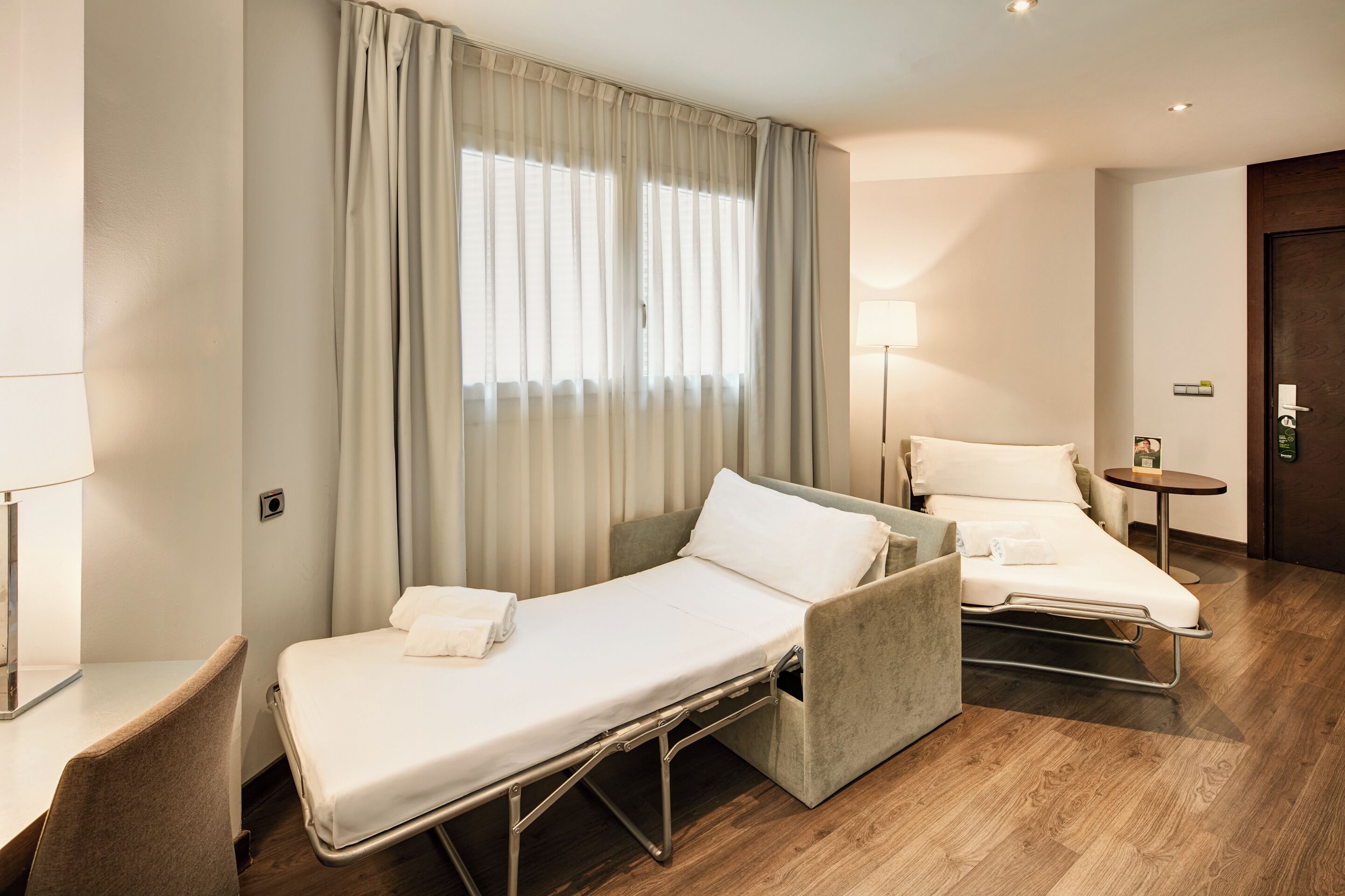 junior suite | minibar, in-room safe, desk, blackout curtains