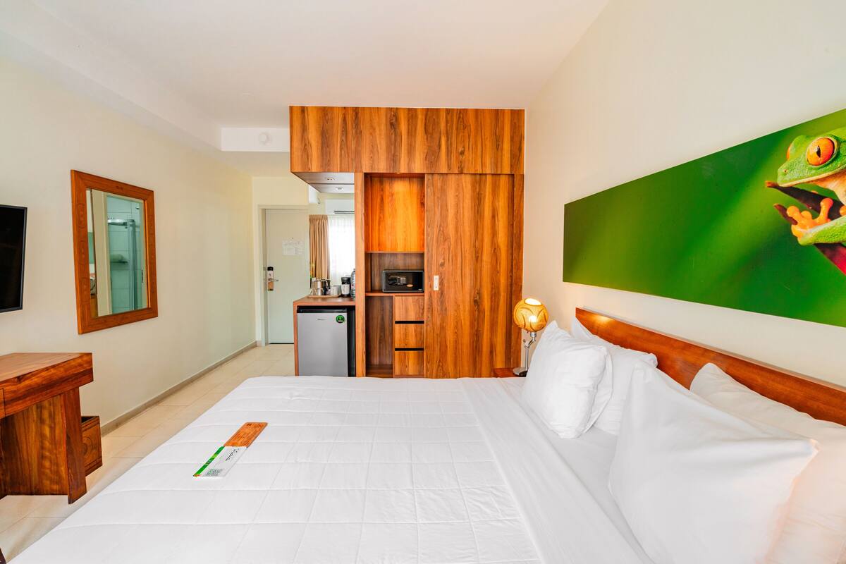 Room, 1 King Bed (River Side) | In-room safe, desk, laptop workspace, iron/ironing board