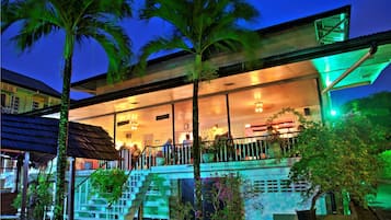 Lunch, dinner served; local cuisine, garden views
