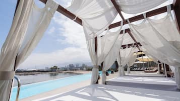 Outdoor pool, open 9:00 AM to 8:30 PM, sun loungers