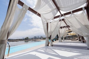 Outdoor pool, open 9:00 AM to 8:30 PM, sun loungers