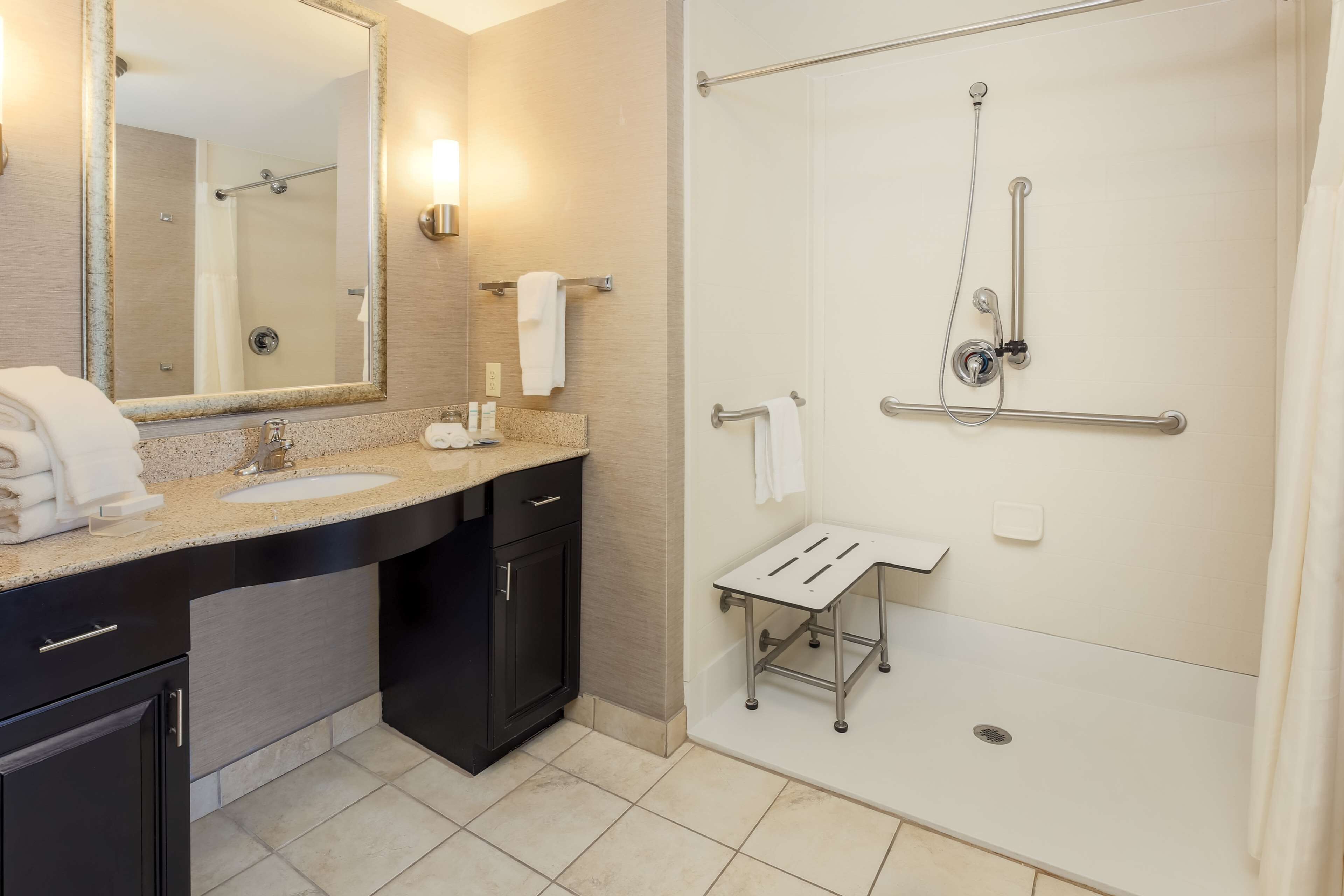 suite, 1 king bed, accessible (mobility & hearing, roll-in shower) | bathroom | free toiletries, hair dryer, towels