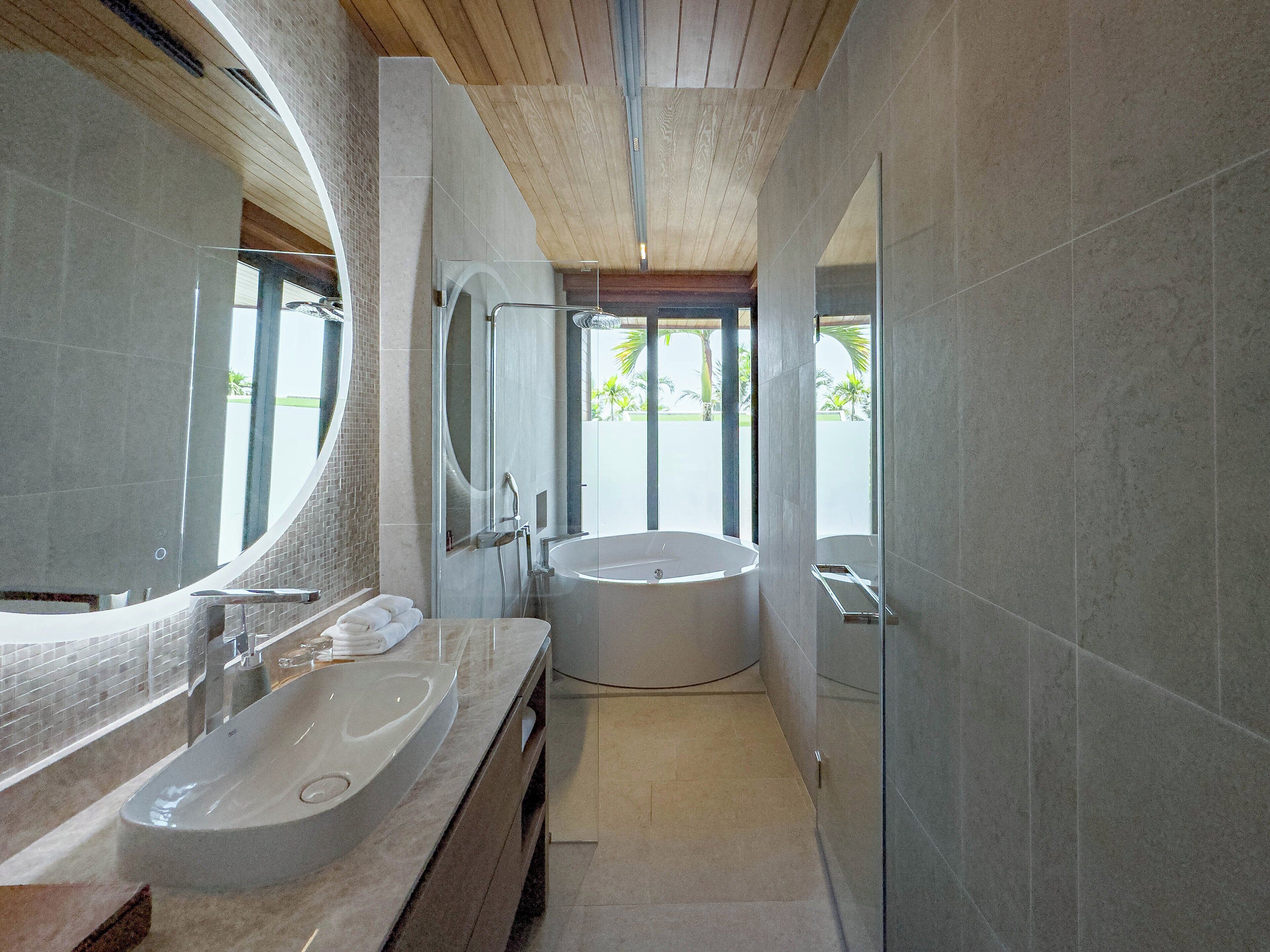 duplex 2-bedroom | bathroom | separate bathtub and shower, rainfall showerhead, hair dryer, bathrobes