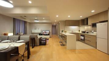 Chambre Exécutive, 3 chambres | Cuisine privée