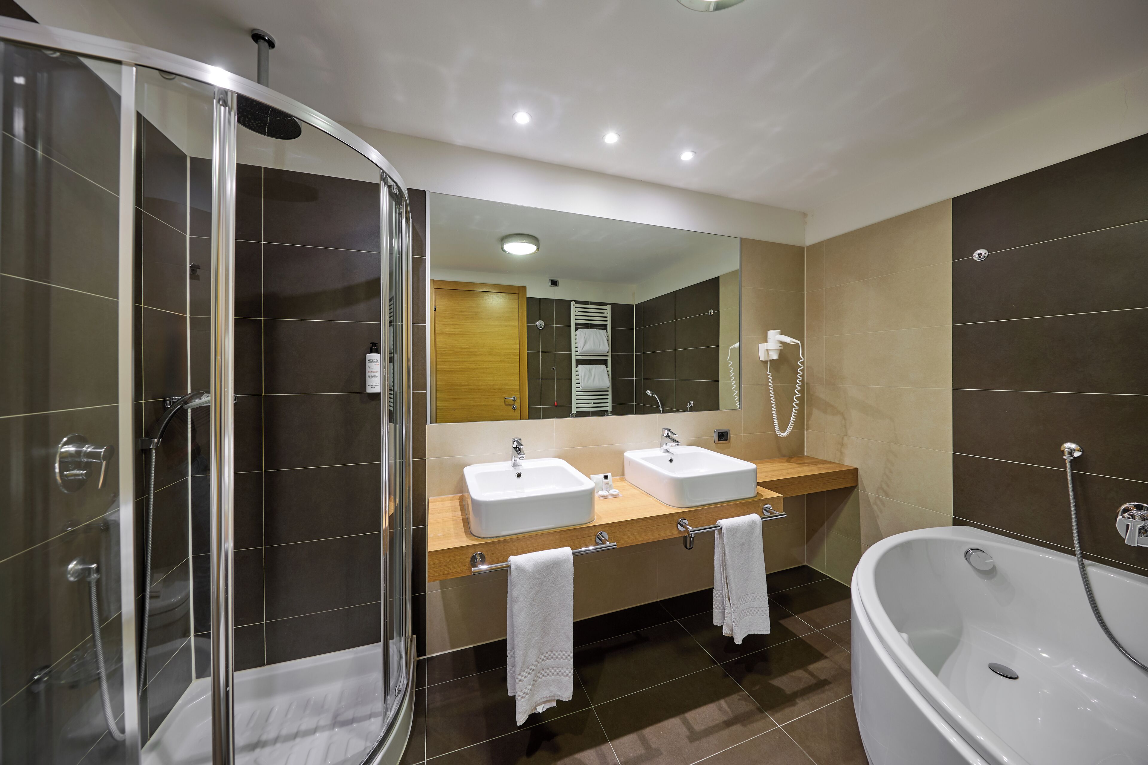 free toiletries, hair dryer, bidet, towels