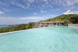 Outdoor pool, pool umbrellas, pool loungers