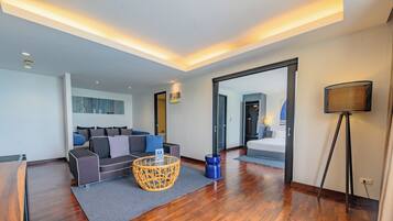 Samui Ocean View Suite - Adults Only | Living area | Flat-screen TV