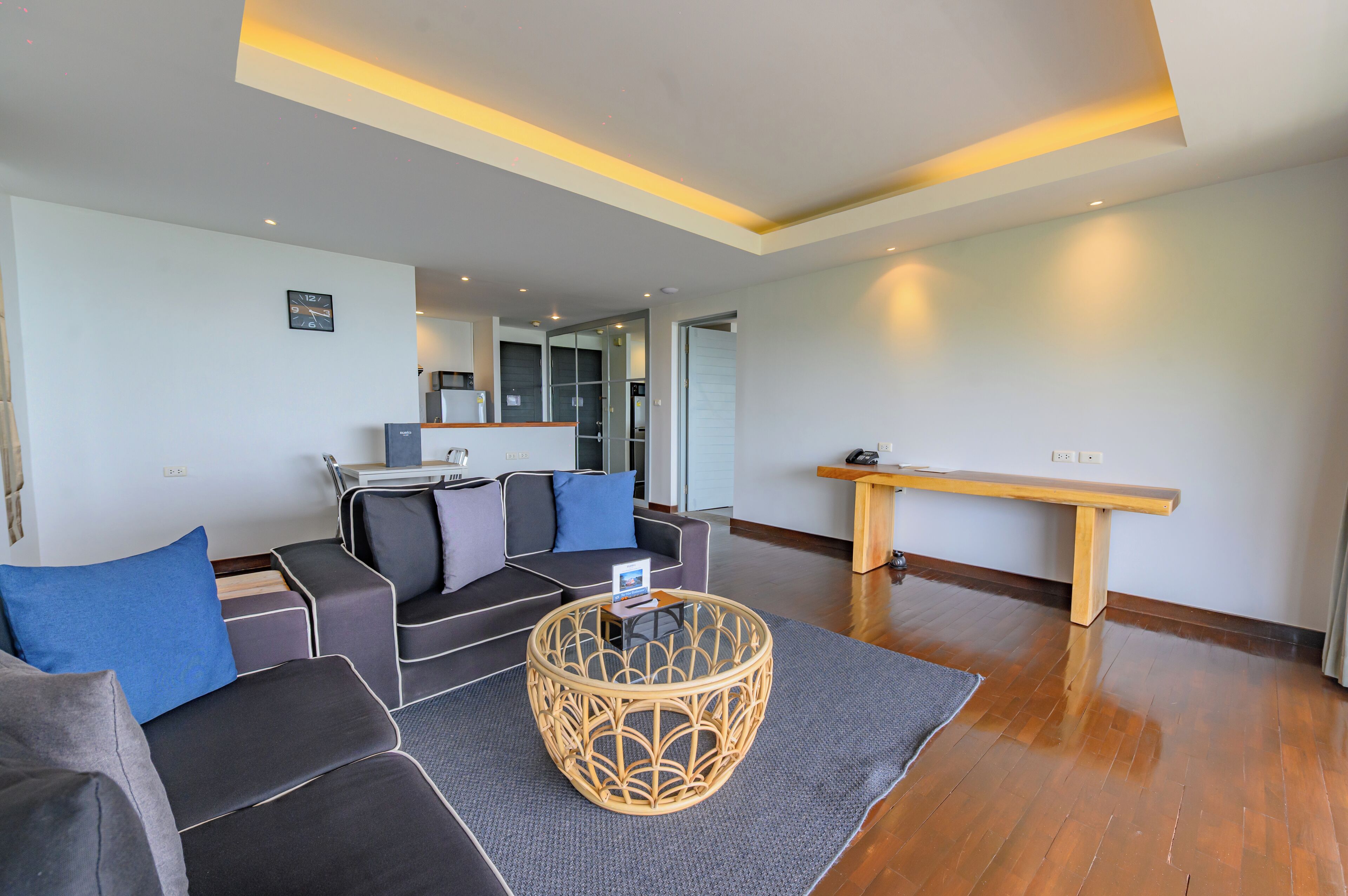 wow apartment | living area | flat-screen tv