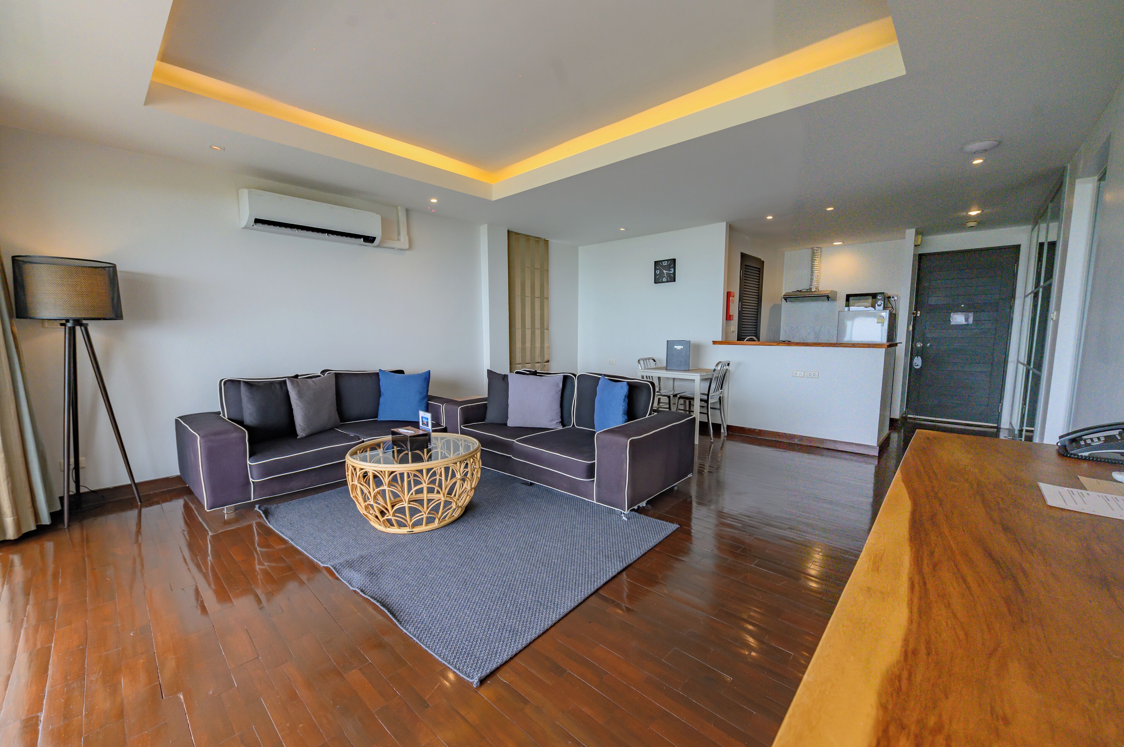 wow apartment | living area | flat-screen tv