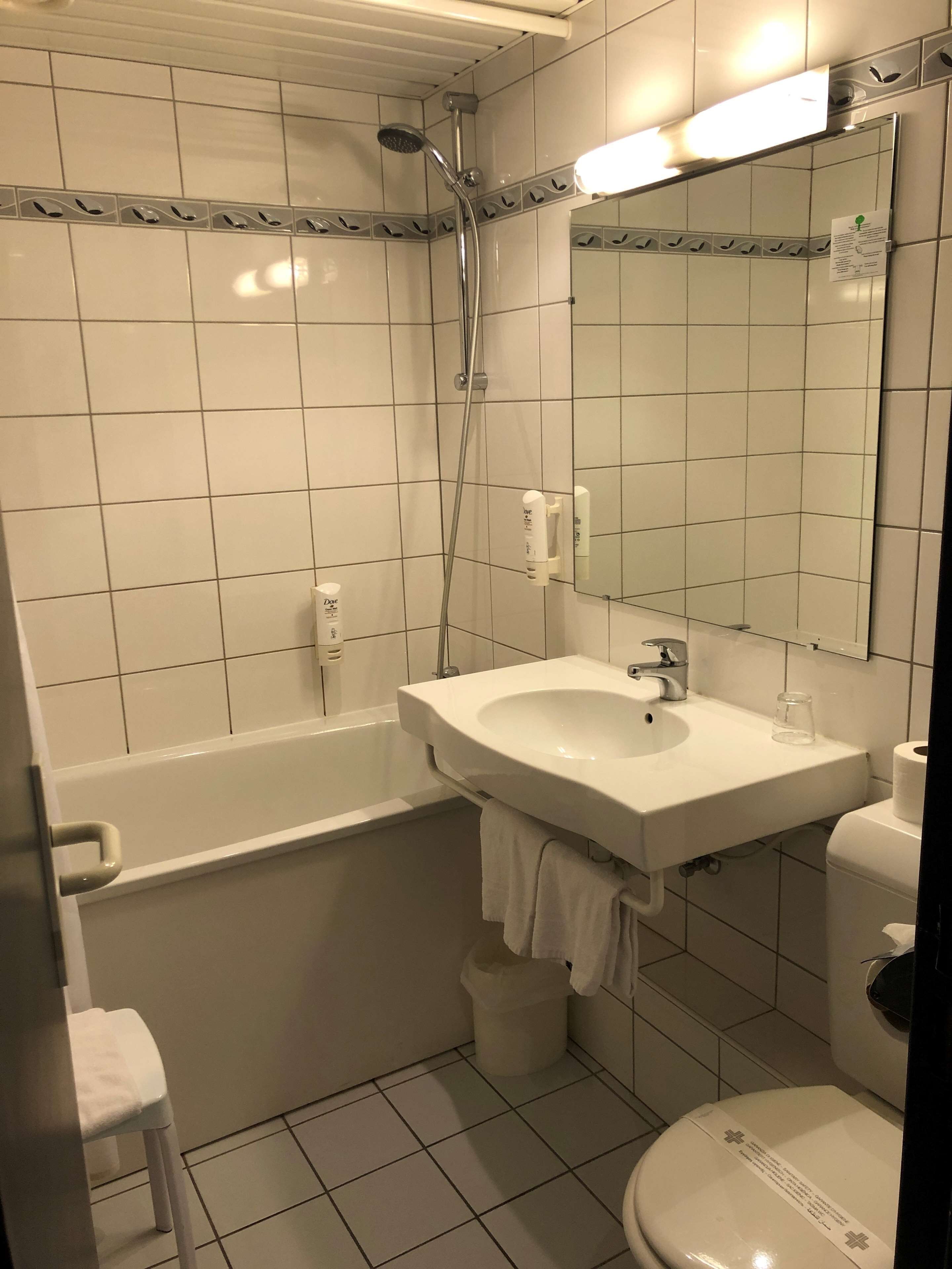 rainfall showerhead, eco-friendly toiletries, hair dryer, towels