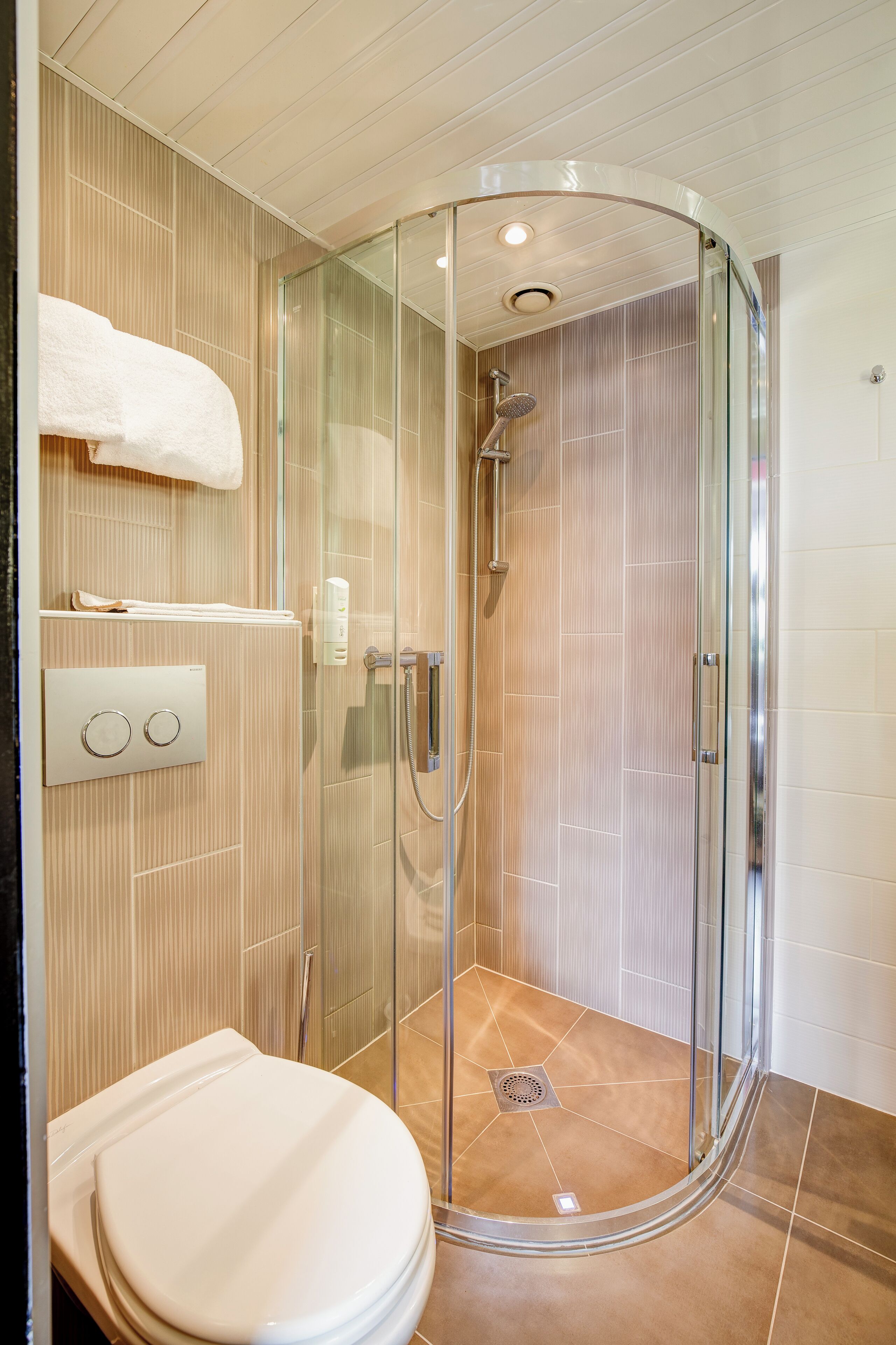 standard room, multiple beds | bathroom | rainfall showerhead, eco-friendly toiletries, hair dryer, towels