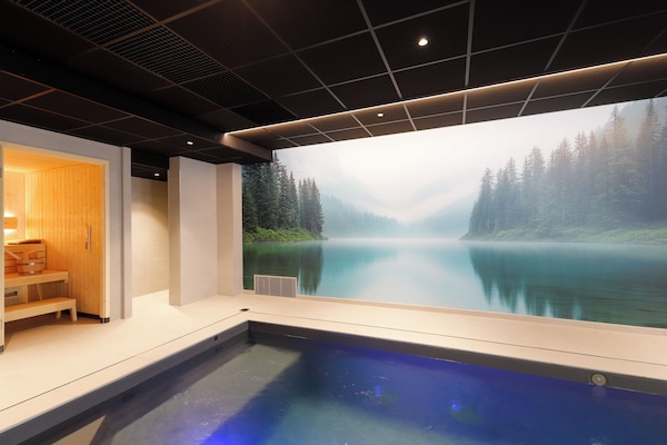 Indoor pool, open 7:00 AM to 10:00 PM, free pool cabanas, pool loungers