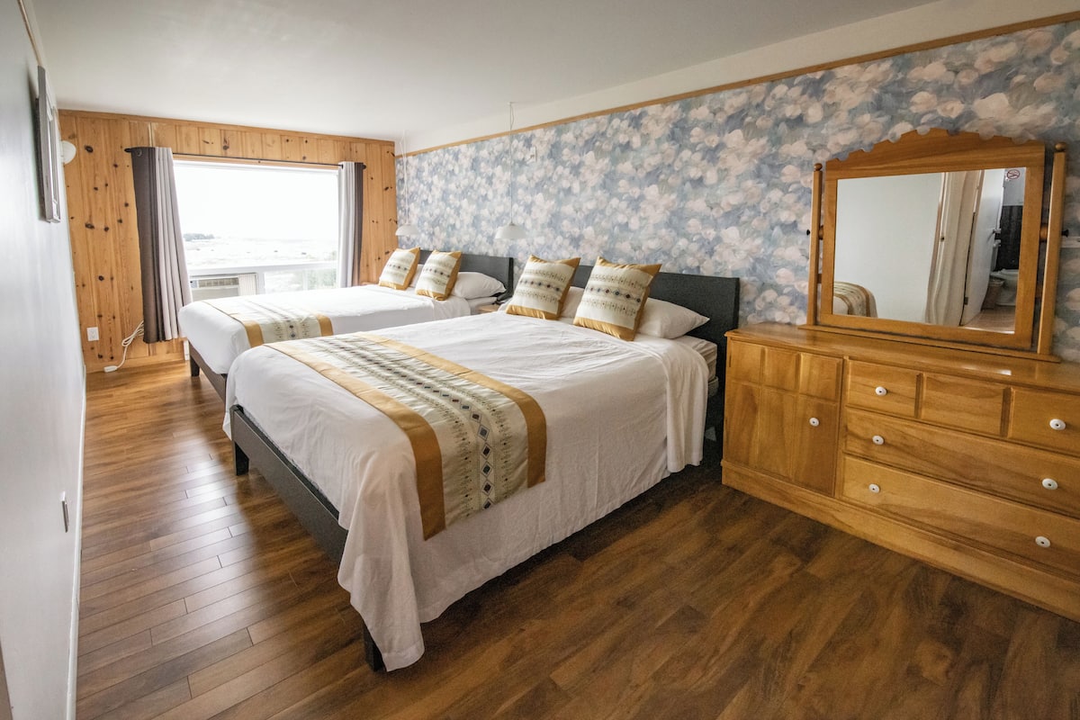 Chambre triple familiale | Lit avec matelas Select Comfort, fer et planche à repasser