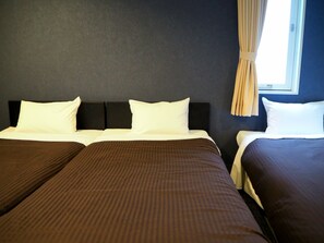 Standard Triple Room, Non Smoking | Down comforters, desk, laptop workspace, iron/ironing board - Grampus Inn Osaka Namba (Osaka)
