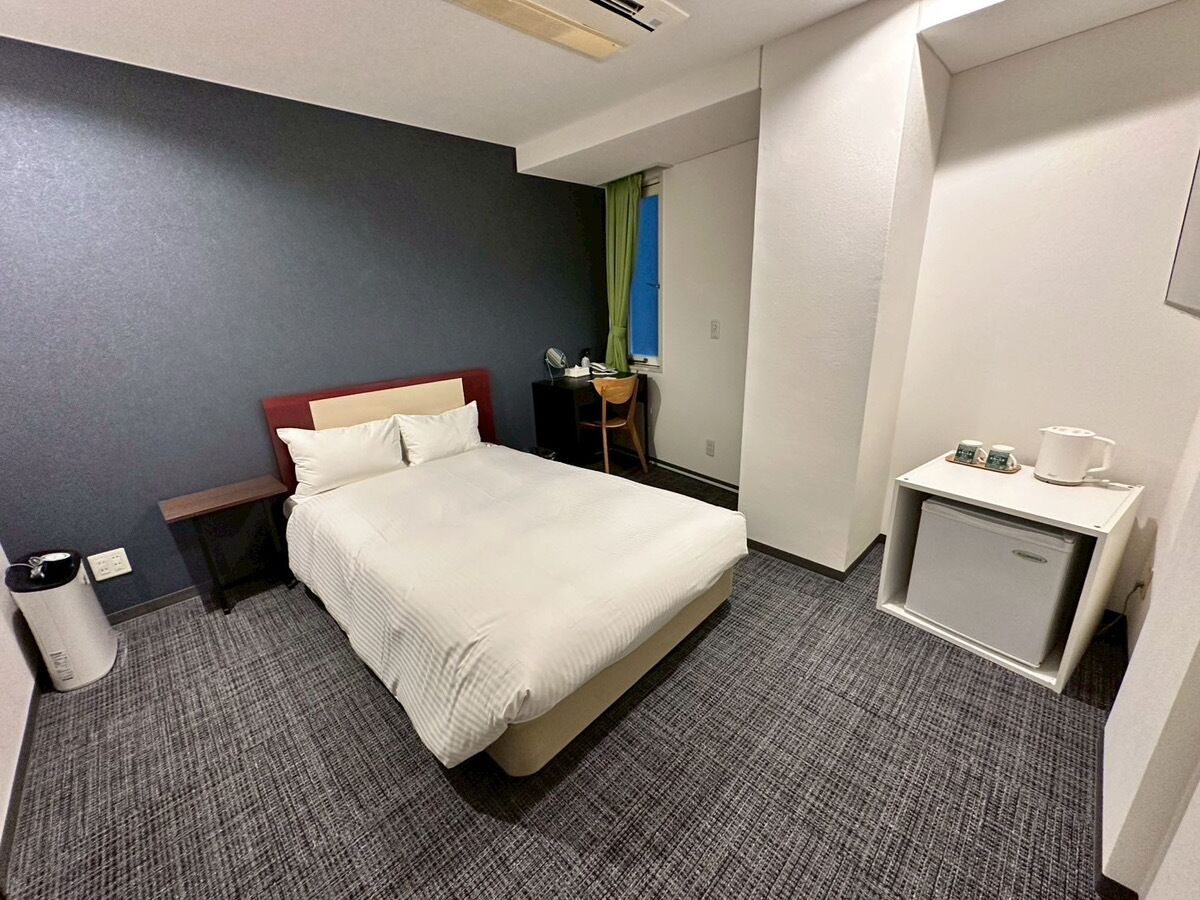 Economy Double Room, Non Smoking | Down duvets, desk, laptop workspace, iron/ironing board