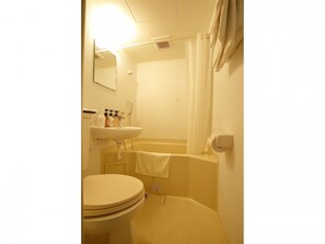 Combined shower/tub, free toiletries, hair dryer, bathrobes