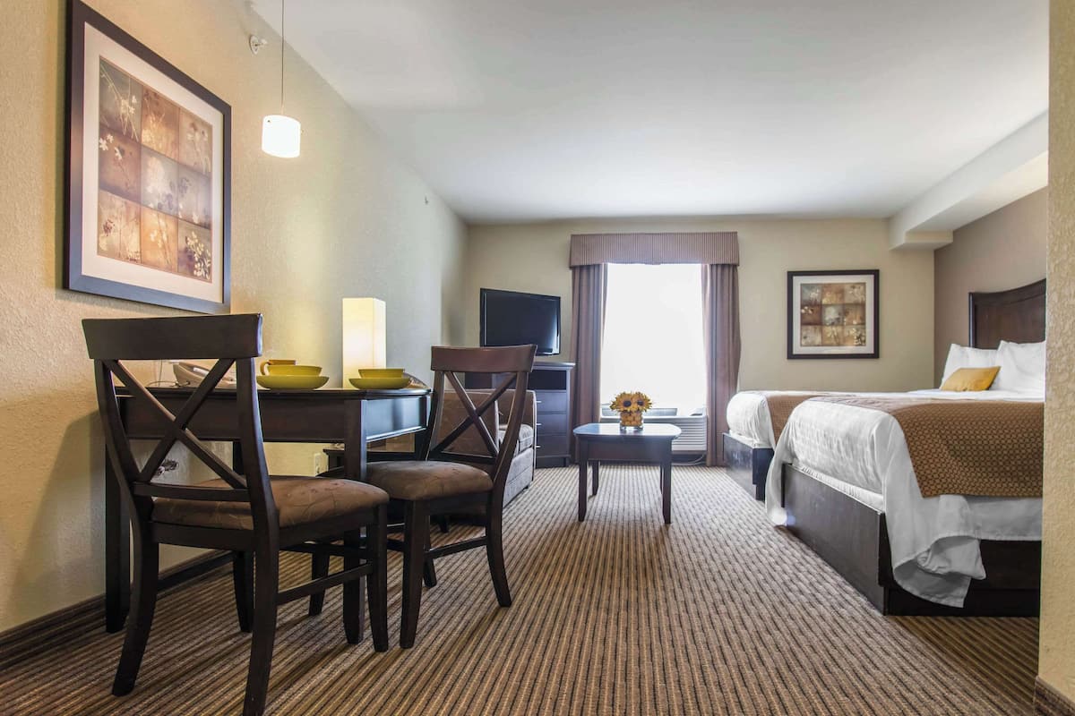 Deluxe Suite, Multiple Beds, Non Smoking | 1 bedroom, pillowtop beds, desk, iron/ironing board