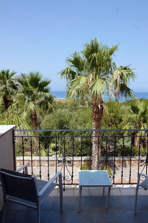 Triple Room, Sea View | Individually decorated, individually furnished, desk, bed sheets - Cala dell'Arena (San Vito Lo Capo)