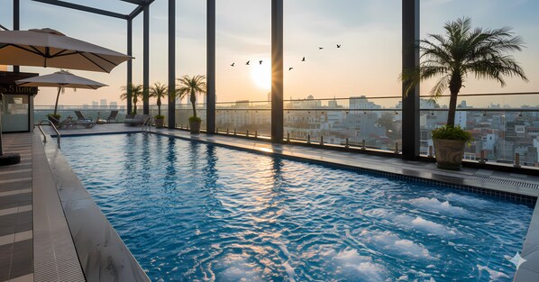 Indoor pool, outdoor pool, open 6:00 AM to 8:00 PM, pool umbrellas