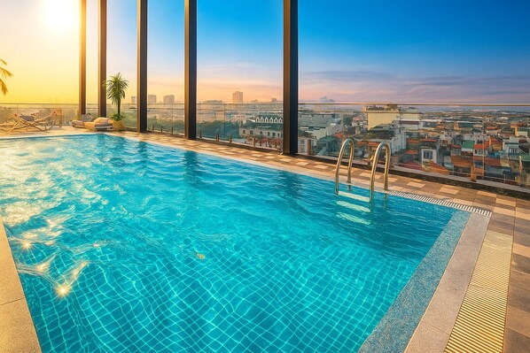 Indoor pool, outdoor pool, open 6:00 AM to 8:00 PM, pool umbrellas