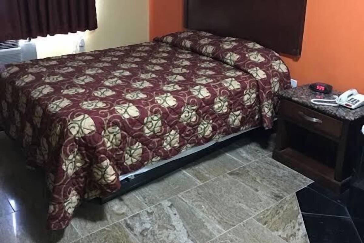 Premium bedding, pillow-top beds, desk, blackout curtains