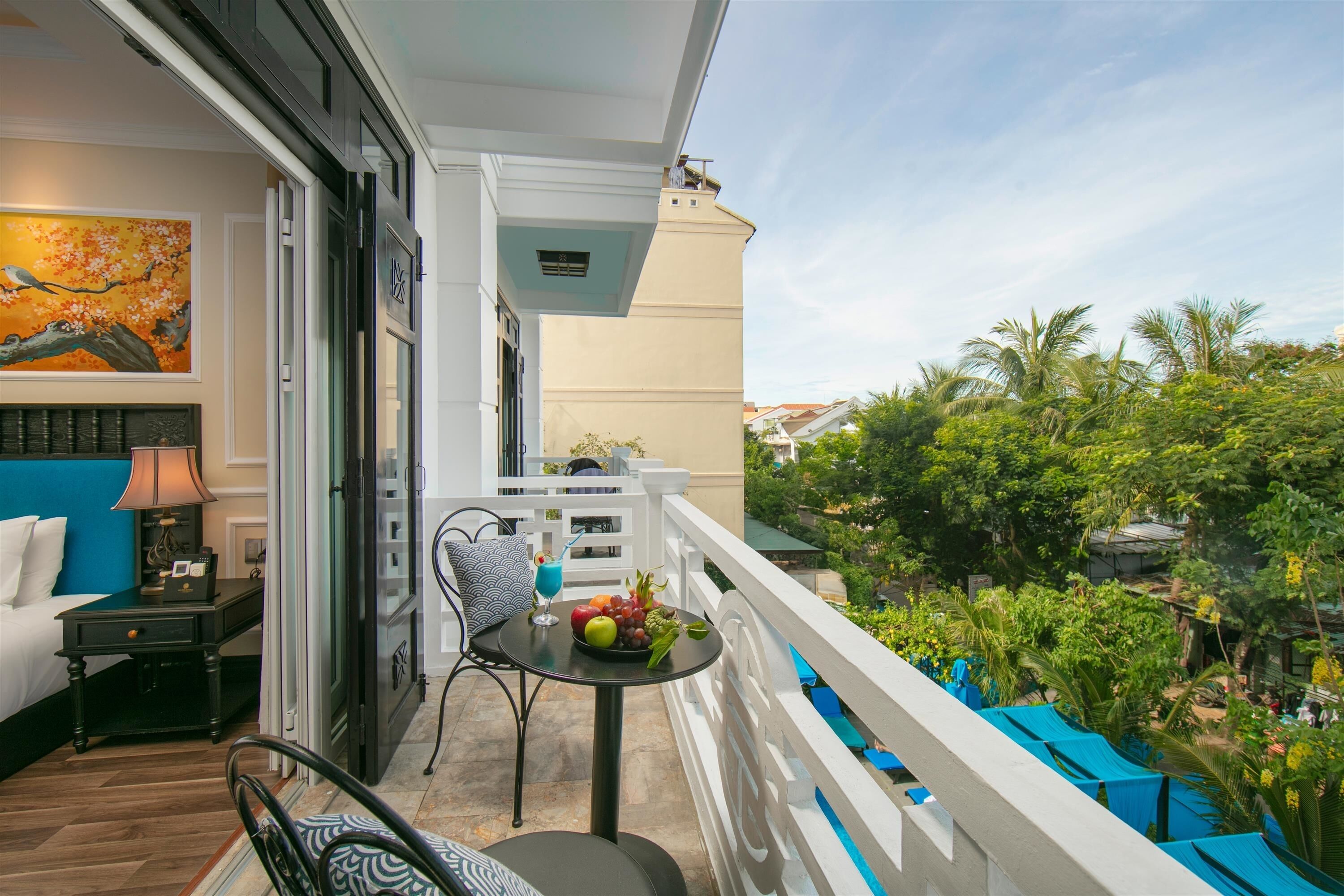 suite double or twin with balcony and pool view | view from room