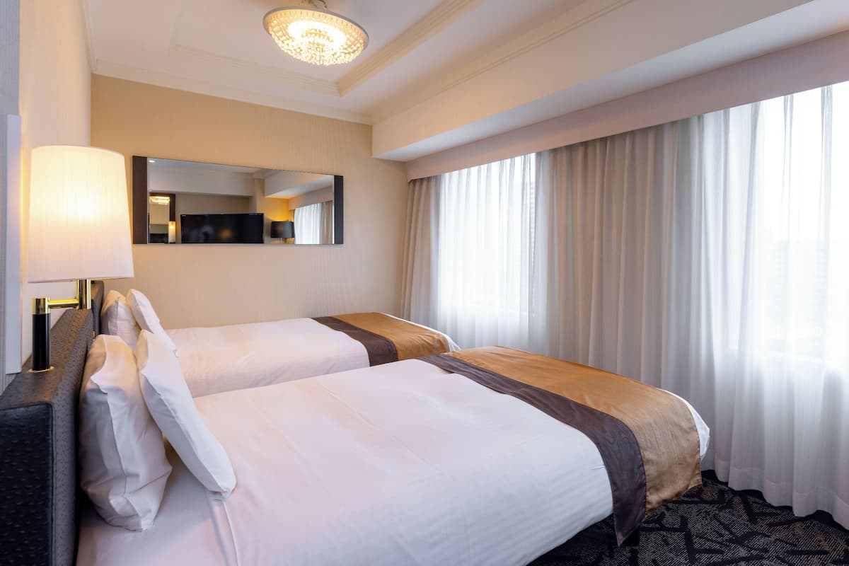 Chambre Deluxe avec lits jumeaux, non-fumeurs | Bureau, Wi-Fi gratuit, draps fournis