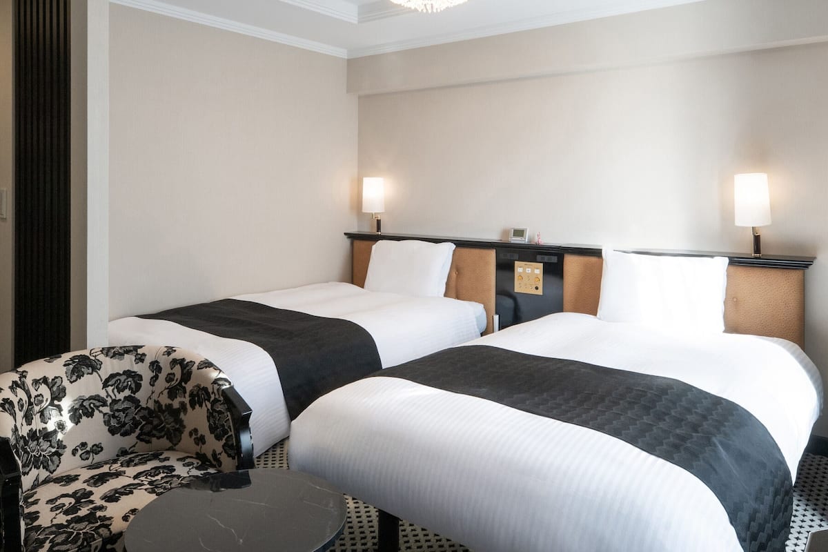 Chambre Deluxe avec lits jumeaux | Literie de qualité supérieure, couette en duvet d'oie, bureau