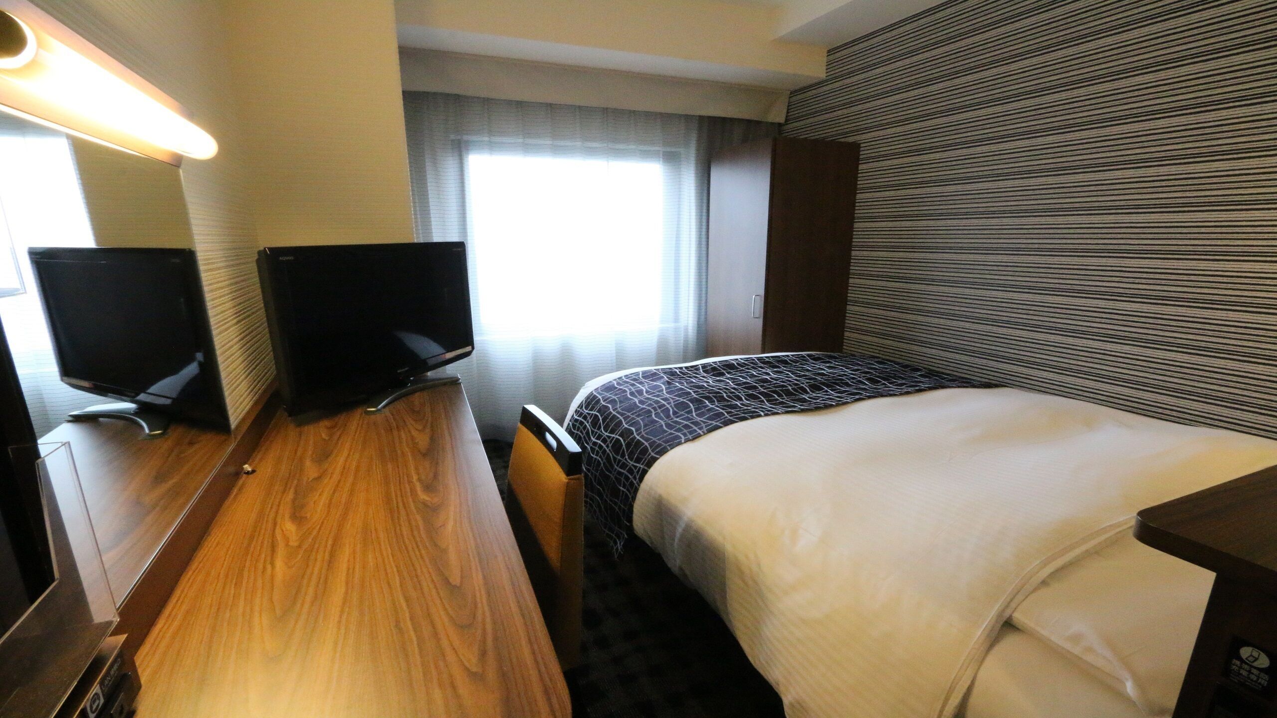Desk, blackout curtains, iron/ironing board (on request), free WiFi