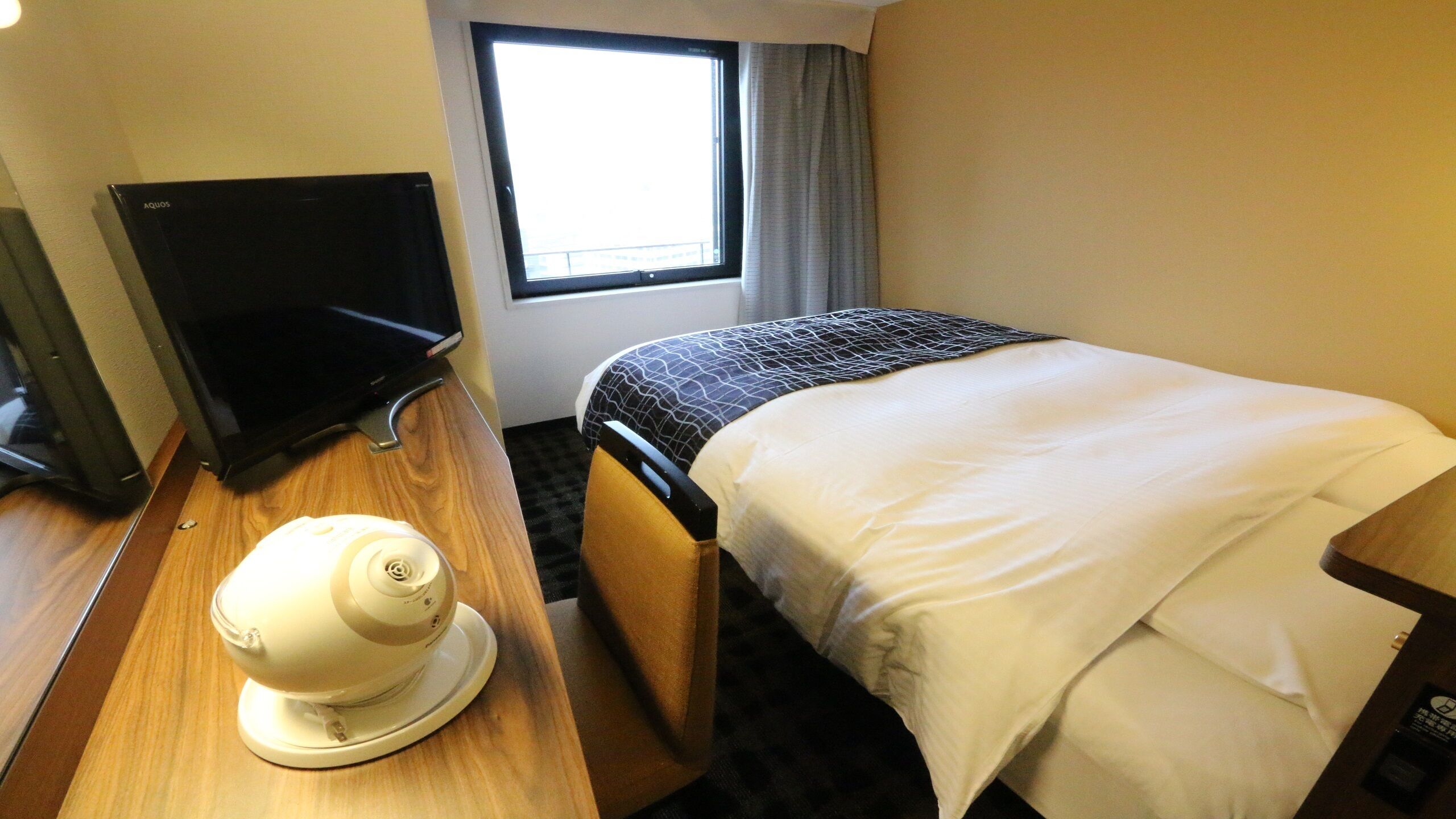 Desk, blackout curtains, iron/ironing board (on request), free WiFi