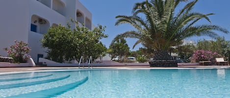 Seasonal outdoor pool, open 9:00 AM to 8:00 PM, free cabanas