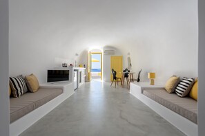 Villa, 1 Bedroom, Pool Access (Caldera View) | Living area | 24-inch LCD TV with cable channels, TV - Anemomilos Hotel & Apartments (Santorini)