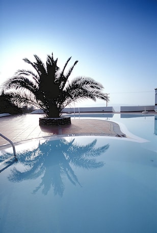 Seasonal outdoor pool, open 9:00 AM to 8:00 PM, free cabanas. Anemomilos Hotel & Apartments