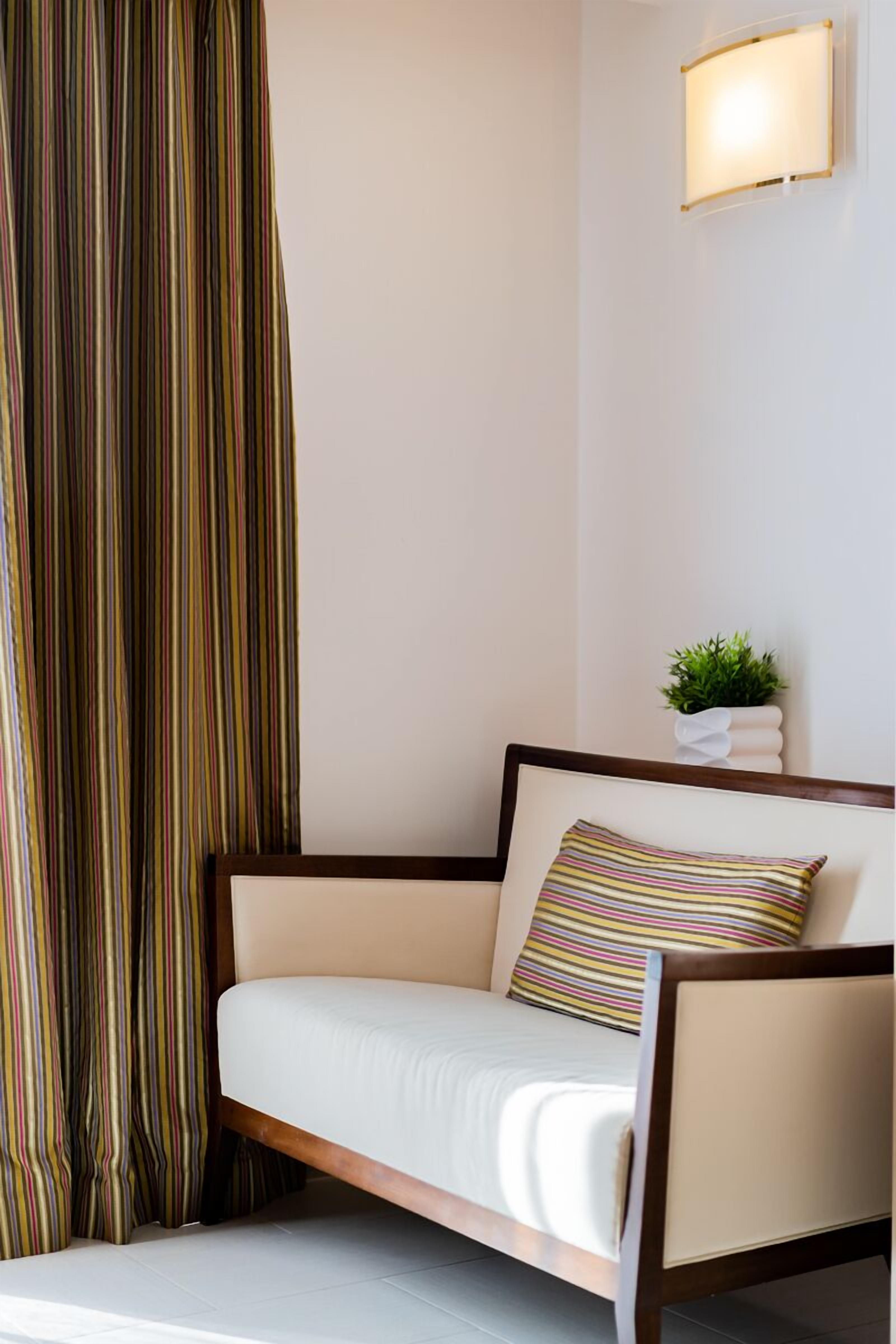 hypo-allergenic bedding, minibar, in-room safe, desk