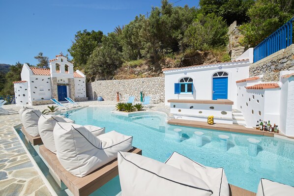 Outdoor pool, pool umbrellas, pool loungers