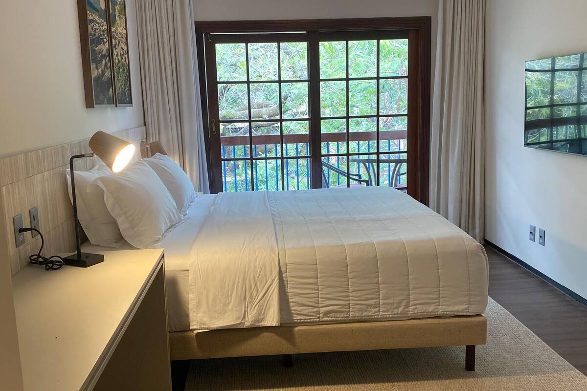 luxury twin room | living area | tv