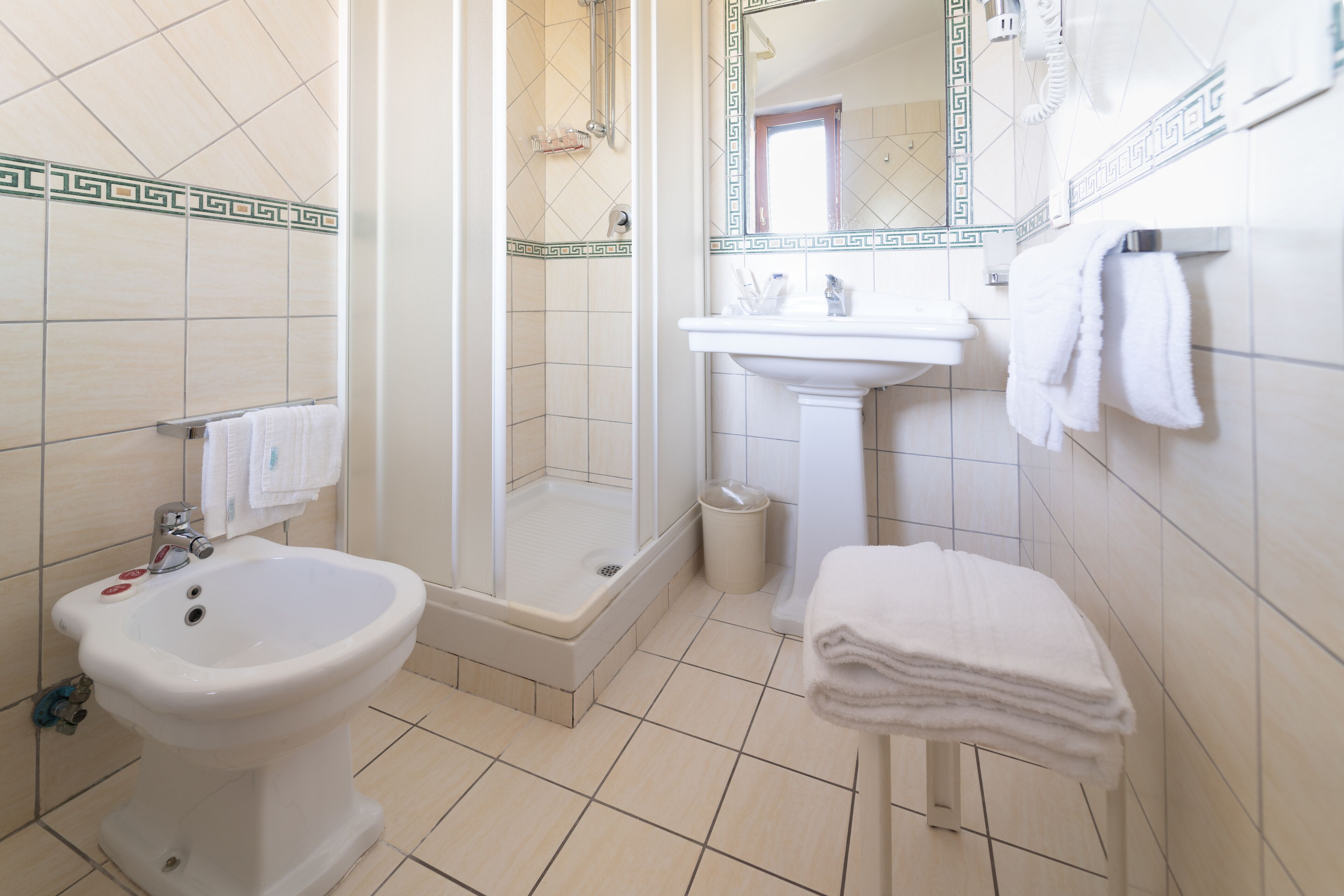 standard double or twin room | bathroom | shower, free toiletries, hair dryer, slippers