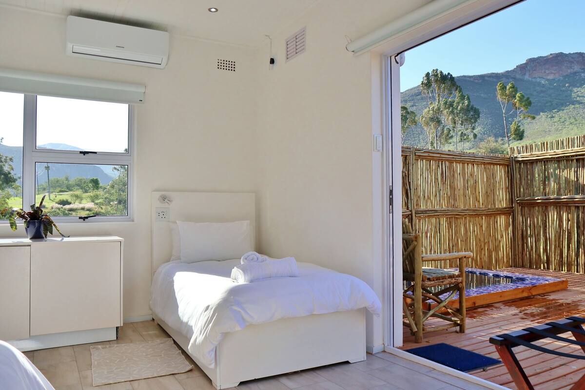 Family Room, Multiple Beds, Mountain View, Ground Floor | Minibar, in-room safe, soundproofing, iron/ironing board