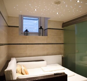 Massages aux pierres chaudes, massages sportifs, 1 salle de soins