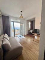 Apartment, 1 Bedroom, Balcony, Sea View | Pillowtop beds, desk, iron/ironing board, free WiFi