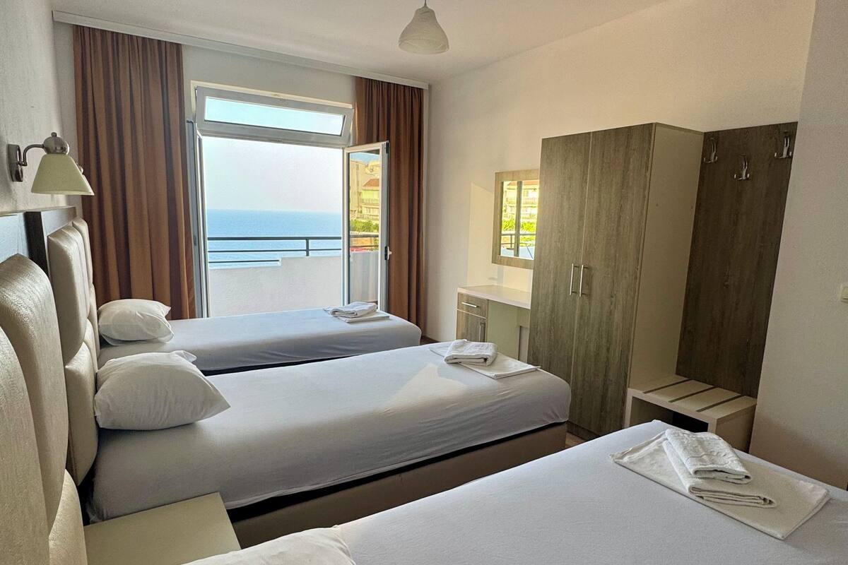 Premium Apartment, 2 Bedrooms, Beach View | Pillowtop beds, desk, iron/ironing board (on request), WiFi (free)