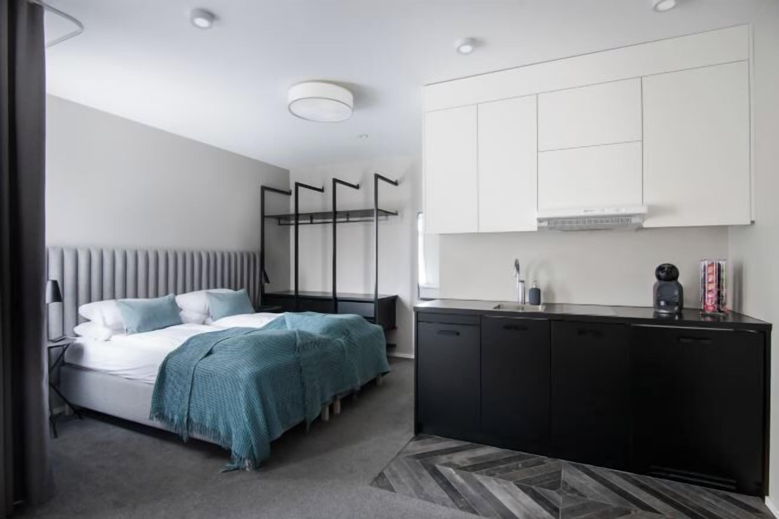 Hypo-allergenic bedding, down duvets, pillow-top beds, in-room safe