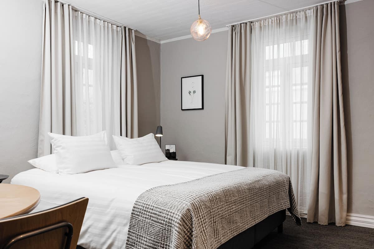 Economy Studio | 1 bedroom, hypo-allergenic bedding, down duvets, pillow-top beds