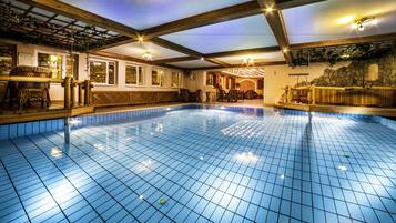 Indoor pool, open 8:00 AM to 8:00 PM, pool loungers