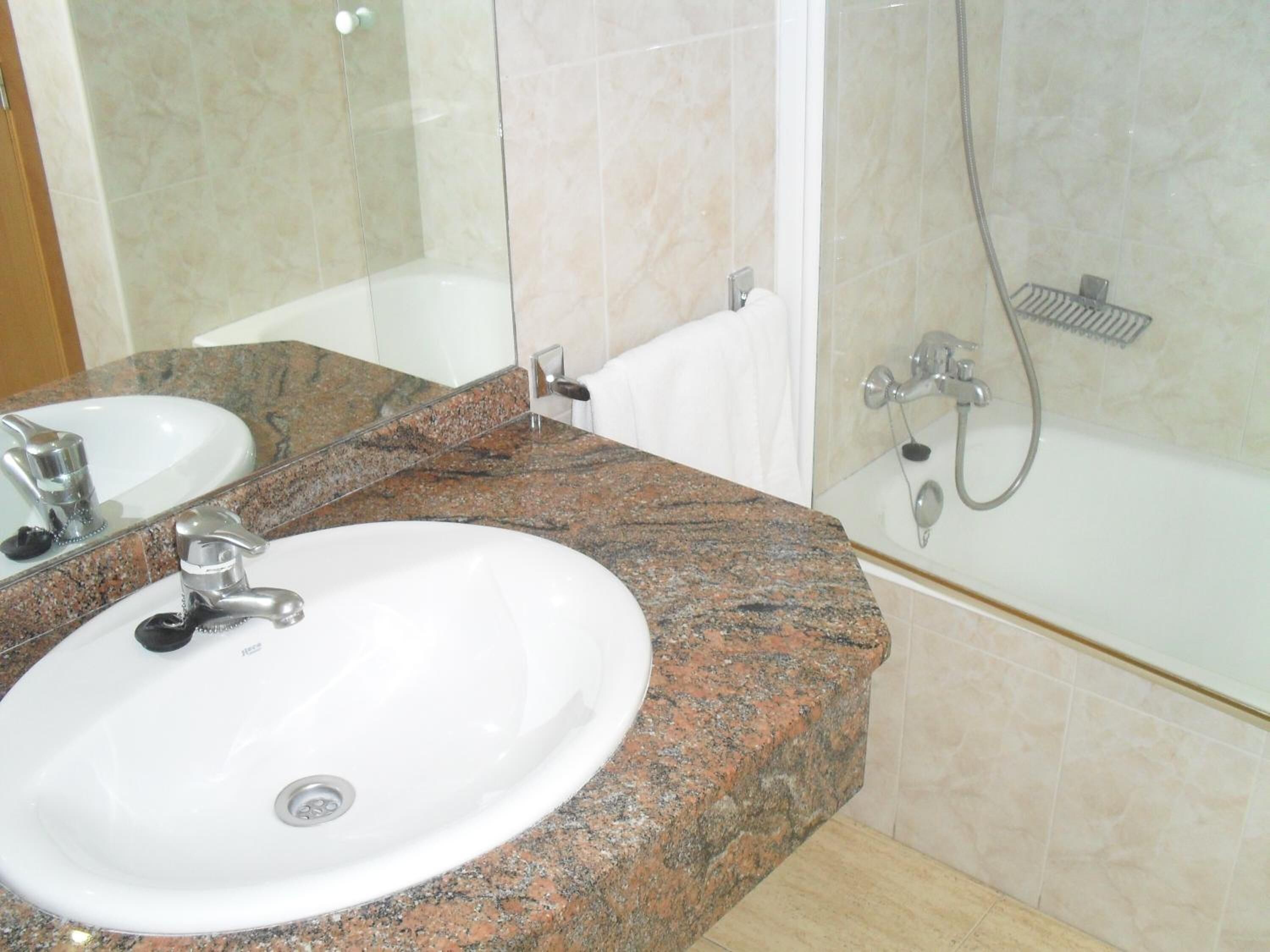 hair dryer, bidet, towels