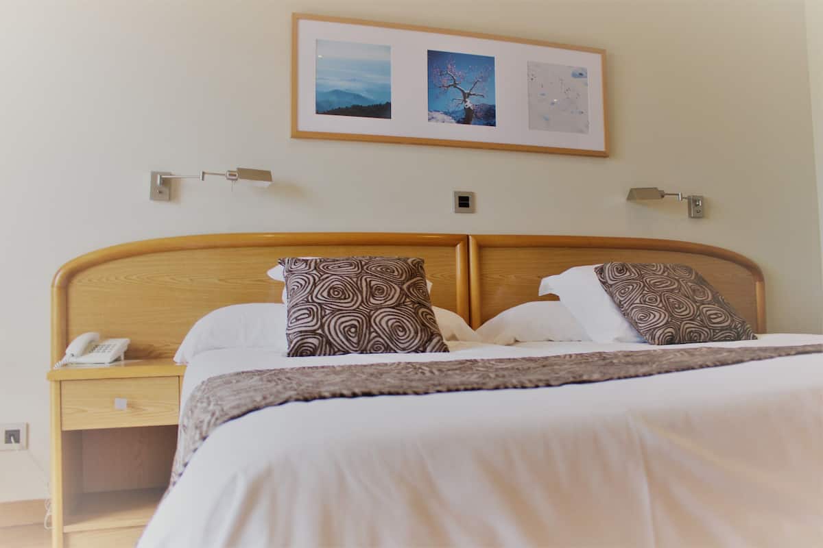 Double Room, Balcony | Minibar, desk, blackout curtains, cots/infant beds