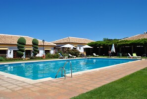 Outdoor pool, pool umbrellas, pool loungers